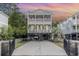 Front elevation view of the house with a driveway at 3704 Chapel Ln., Myrtle Beach, SC 29588