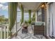 Inviting porch area with outdoor sofa and fire pit, perfect for cozy evenings at 3704 Chapel Ln., Myrtle Beach, SC 29588