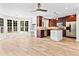 Spacious kitchen and dining area with custom cabinets, stainless steel appliances, and tile floors at 4025 Captiva Row, Myrtle Beach, SC 29579