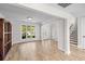 Elegant living room with wood floors, a window view, and an open floor plan at 4025 Captiva Row, Myrtle Beach, SC 29579