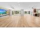 Expansive living room with tile floors, bright windows, ceiling fans, and an entertainment center at 4025 Captiva Row, Myrtle Beach, SC 29579