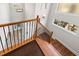Beautiful staircase with wood and iron railing leading to the upper level at 4025 Captiva Row, Myrtle Beach, SC 29579