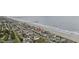 Aerial view showcases home's proximity to the beach, ideal for coastal living and enjoying ocean breezes at 412 Seaside Dr. S, Surfside Beach, SC 29575