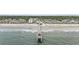 Surfside Beach Pier features an extensive pier stretching out into the ocean at 412 Seaside Dr. S, Surfside Beach, SC 29575