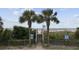 Direct beach access with stairway, palm trees, and bike parking offers idyllic setting at 412 Seaside Dr. S, Surfside Beach, SC 29575