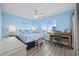Bright bedroom with desk and a comfortable queen bed at 412 Seaside Dr. S, Surfside Beach, SC 29575