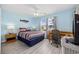 Comfortable bedroom with large windows, great decor, and appealing furnishings at 412 Seaside Dr. S, Surfside Beach, SC 29575