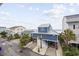 Beautiful coastal home with manicured landscaping and quick access to the beach at 412 Seaside Dr. S, Surfside Beach, SC 29575