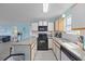 Well-appointed kitchen featuring granite countertops and white cabinetry at 412 Seaside Dr. S, Surfside Beach, SC 29575