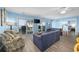 Living room with sliding glass doors that offer views of the ocean at 412 Seaside Dr. S, Surfside Beach, SC 29575