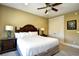 Inviting bedroom with a ceiling fan, neutral walls, and coordinating furniture for a relaxing retreat at 4850 Cantor Ct. # 202, North Myrtle Beach, SC 29582