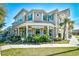 Charming two-story commercial building featuring multiple shops, lush landscaping, and a welcoming entrance at 4850 Cantor Ct. # 202, North Myrtle Beach, SC 29582