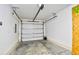 Clean, empty two-car garage ready for parking and storage with a modern garage door opener at 4850 Cantor Ct. # 202, North Myrtle Beach, SC 29582