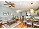 Inviting living space with an open layout, featuring a dining area, kitchen, and comfortable seating at 4850 Cantor Ct. # 202, North Myrtle Beach, SC 29582