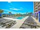 Resort-style pool with lounge chairs and cabanas, perfect for relaxation and enjoyment under the sun at 4850 Cantor Ct. # 202, North Myrtle Beach, SC 29582