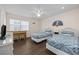 Bright bedroom featuring two twin beds, a desk, and a side table at 510 S Ocean Blvd., Surfside Beach, SC 29575