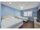 Cozy bedroom features two beds, window with blinds, and a ceiling fan at 510 S Ocean Blvd., Surfside Beach, SC 29575