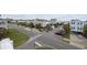 Street-level view of a two-story home near the beach and businesses at 510 S Ocean Blvd., Surfside Beach, SC 29575