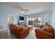 Cozy living room with leather furniture, sliding glass doors to deck, and flat-screen TV at 510 S Ocean Blvd., Surfside Beach, SC 29575