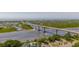 Aerial view of a scenic bridge spanning a waterway with a view of the coastline at 532 Medcalf Dr. Sw, Sunset Beach, NC 28468