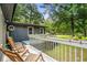 Scenic view from the porch, complete with rocking chairs and a view of the green lawn at 532 Medcalf Dr. Sw, Sunset Beach, NC 28468