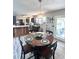 Eat-in kitchen with granite counters, stainless steel appliances, and table seating four at 532 Medcalf Dr. Sw, Sunset Beach, NC 28468