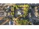 Aerial view of the home surrounded by lush greenery and an in-ground swimming pool at 5825 Peachtree Rd., Myrtle Beach, SC 29588