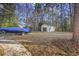 Spacious backyard featuring a storage shed and parking space for a boat at 5825 Peachtree Rd., Myrtle Beach, SC 29588