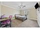 A lovely bedroom with a ceiling fan, a nice window view, and a study desk at 5825 Peachtree Rd., Myrtle Beach, SC 29588