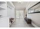 A lovely, spacious entryway with neutral paint, tile floors, and access to the backyard at 5825 Peachtree Rd., Myrtle Beach, SC 29588