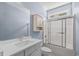 Clean bathroom featuring a shower/tub combo and a sleek vanity with ample storage space at 615 Woodbine Ct., Myrtle Beach, SC 29579