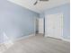 Light-filled bedroom with ceiling fan, wood floors, and closet at 615 Woodbine Ct., Myrtle Beach, SC 29579