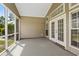 Enclosed screened porch with direct access to outside, perfect for relaxation and entertainment at 615 Woodbine Ct., Myrtle Beach, SC 29579
