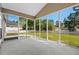 Screened-in porch offering views of the backyard and providing an ideal outdoor living space at 615 Woodbine Ct., Myrtle Beach, SC 29579
