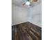 This bedroom features wood-look floors, ceiling fan, and two electrical outlets on each wall at 6204 Sweetwater Blvd. # 6204, Murrells Inlet, SC 29576