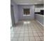 Spacious living room features tile flooring and access to the updated kitchen at 6204 Sweetwater Blvd. # 6204, Murrells Inlet, SC 29576