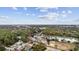 An aerial view of a serene community on the lake, with a swimming pool and lush greenery all around at 627 Bonaventure Dr. # 101, Myrtle Beach, SC 29577