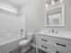 Bathroom features a white vanity, toilet, and tub-shower combination at 627 Bonaventure Dr. # 101, Myrtle Beach, SC 29577