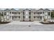 New construction townhome with durable siding and covered balconies at 627 Bonaventure Dr. # 101, Myrtle Beach, SC 29577