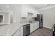 Modern kitchen features stainless steel appliances, granite countertops, and white cabinetry at 627 Bonaventure Dr. # 101, Myrtle Beach, SC 29577