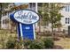 Lake View Villas sign with beautiful landscaping and building in background at 627 Bonaventure Dr. # 101, Myrtle Beach, SC 29577