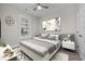 Furnished bedroom with bed, modern art and wood-look laminate flooring at 627 Bonaventure Dr. # 201, Myrtle Beach, SC 29577