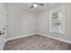 Unfurnished bedroom with neutral walls and wood-look laminate flooring at 627 Bonaventure Dr. # 201, Myrtle Beach, SC 29577