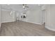 Spacious living room features wood flooring, recessed lighting and a ceiling fan at 627 Bonaventure Dr. # 201, Myrtle Beach, SC 29577