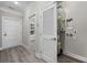 Hallway view of the utility room with access to the hot water and HVAC systems at 627 Bonaventure Dr. # 201, Myrtle Beach, SC 29577