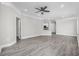 Spacious living area with gray floors, recessed lighting, ceiling fan, and neutral color scheme at 627 Bonaventure Dr. # 203, Myrtle Beach, SC 29577