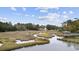 Picturesque view of waterfront landscape and dock at 627 Bonaventure Dr. # 204, Myrtle Beach, SC 29577