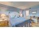 Tastefully designed bedroom with a cozy bed and adjacent bathroom for convenience at 647 Norris Dr., Pawleys Island, SC 29585