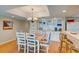 A dining area with seating for six and a built-in wet bar at 647 Norris Dr., Pawleys Island, SC 29585