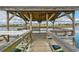 Picturesque community dock overlooking calm waters and marshlands, with seating areas and views at 647 Norris Dr., Pawleys Island, SC 29585